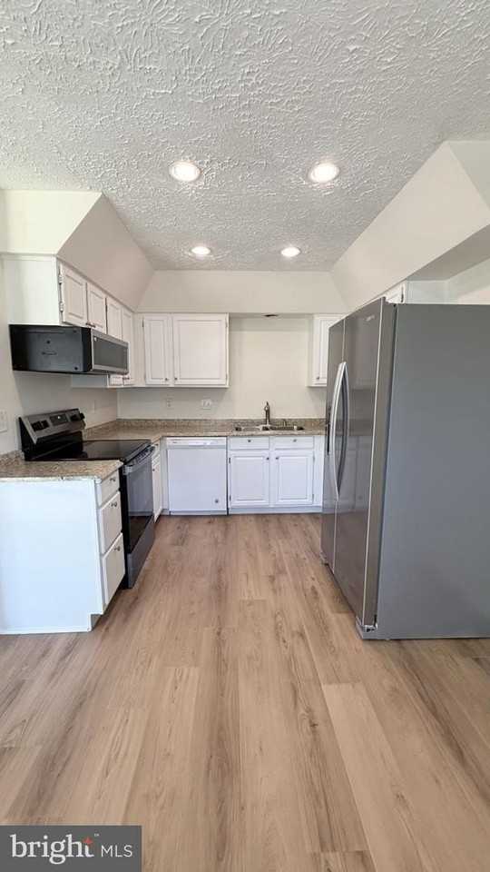 13320 Burkitts Rd - Photo 5 of 21