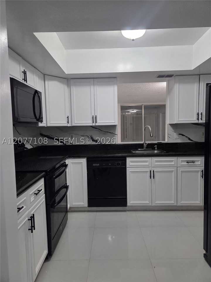1020 Nw 80th Ave #203 - Photo 2 of 24