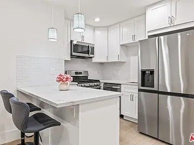 16235 Parthenia St - Photo 6 of 10