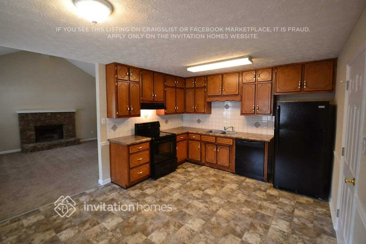 1903 Atha Woods Dr - Photo 2 of 8