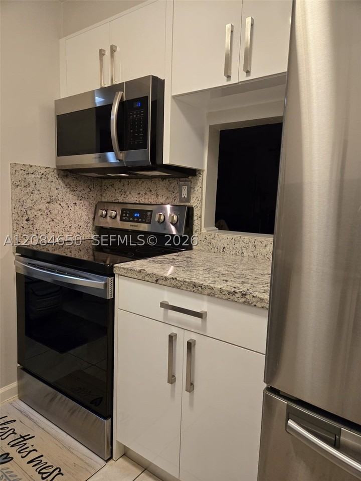 14321 N Kendall Dr #210F - Photo 3 of 22