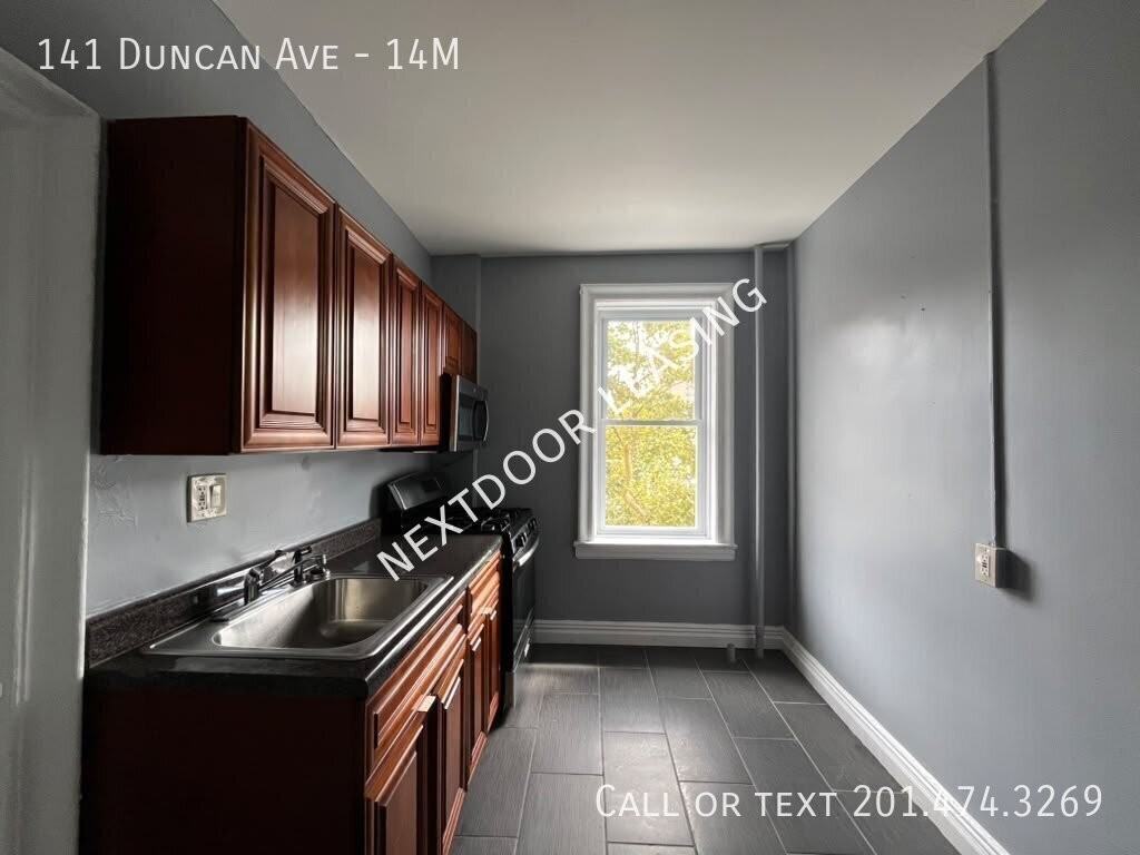 141 Duncan Ave #14M - Photo 2 of 8