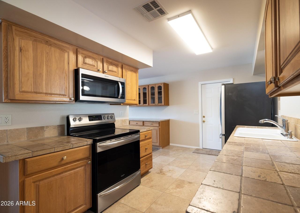 11208 N 105th Ave - Photo 5 of 26