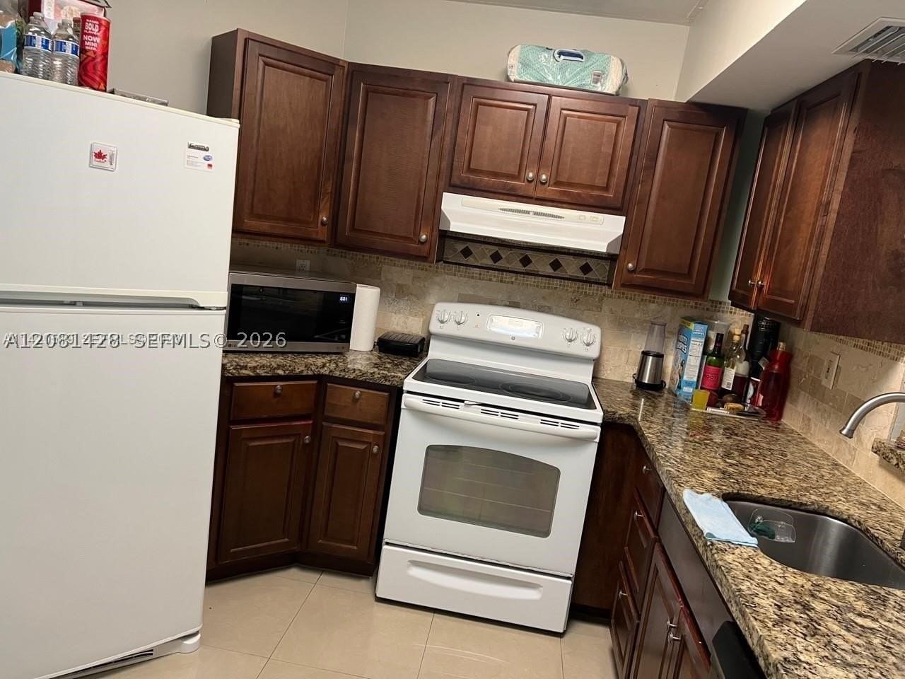9711 Fontainebleau Blvd #D103 - Photo 3 of 13