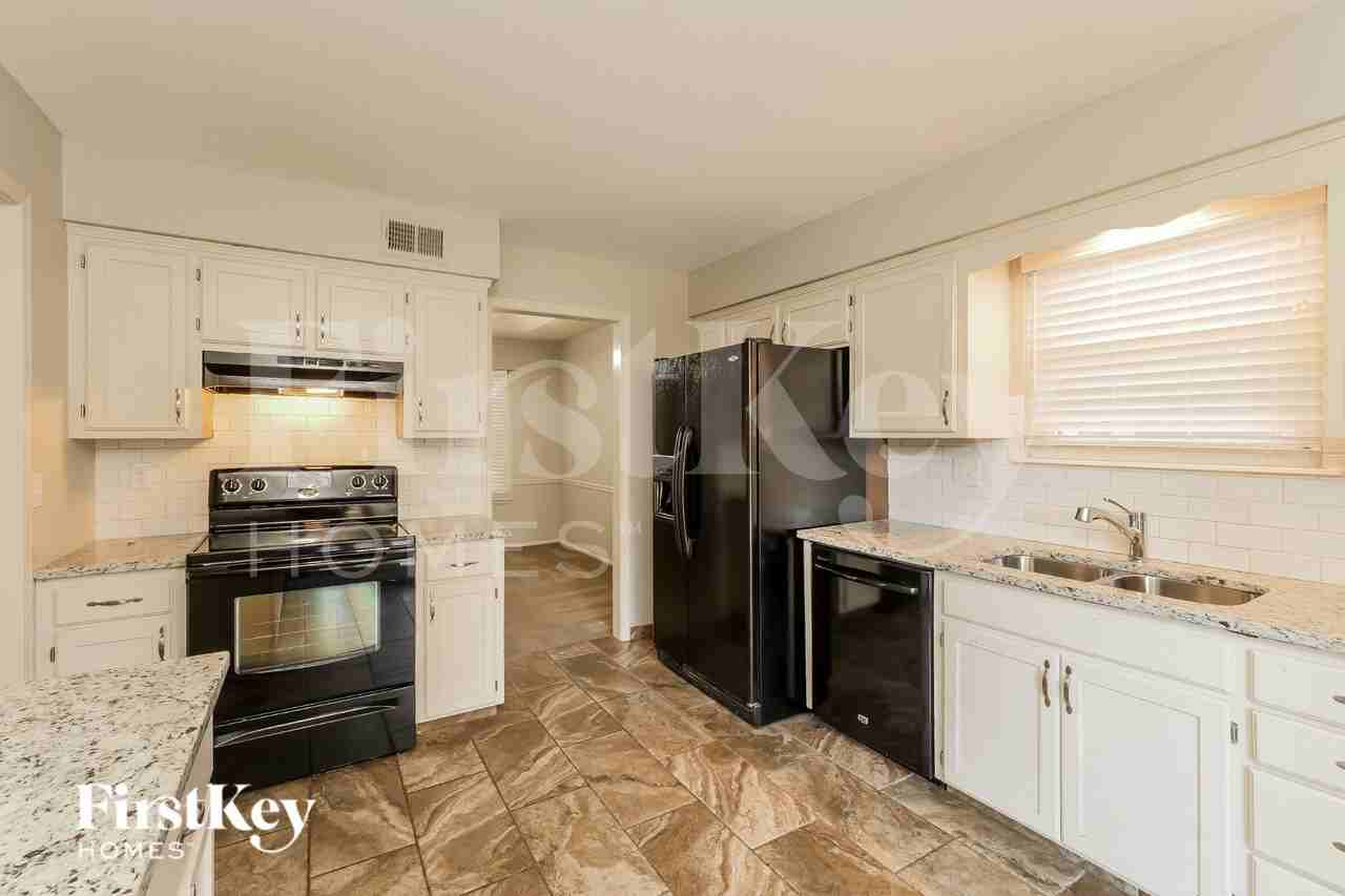 15208 W 91st Pl - Photo 6 of 16
