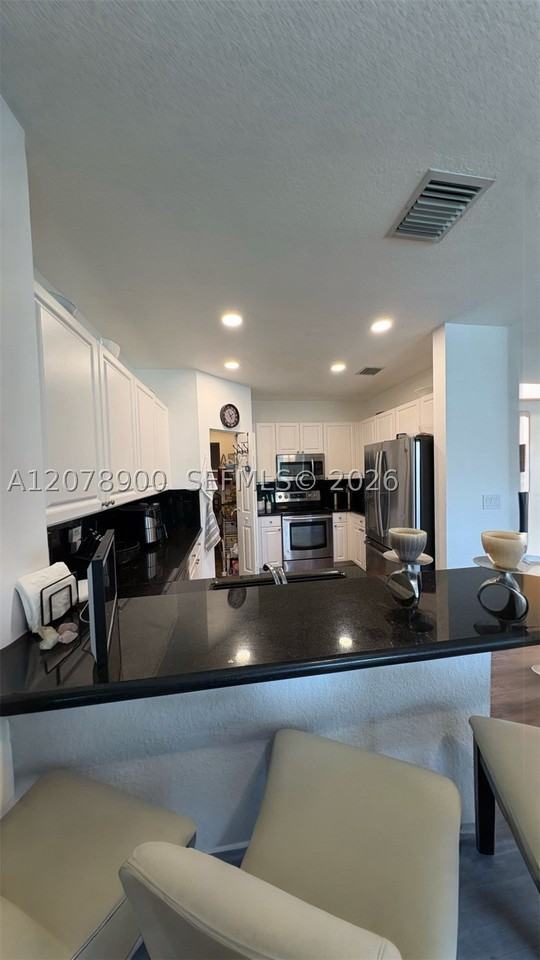 6691 Nw 107th Ct - Photo 6 of 34