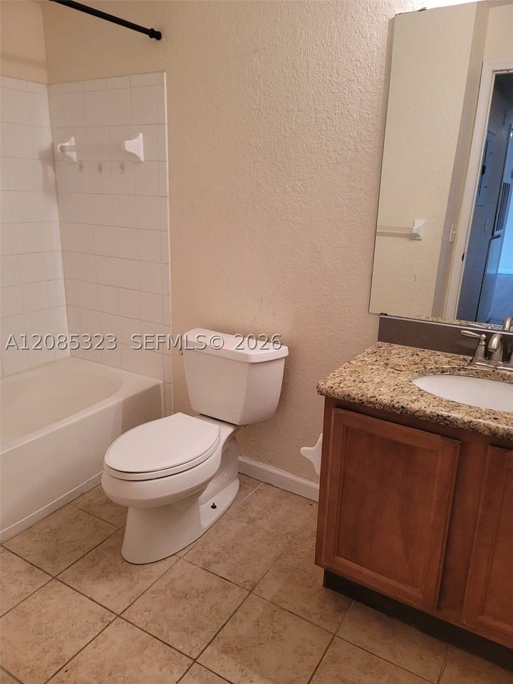 14049 FAIRWAY ISLAND DR #123 - Photo 4 of 19