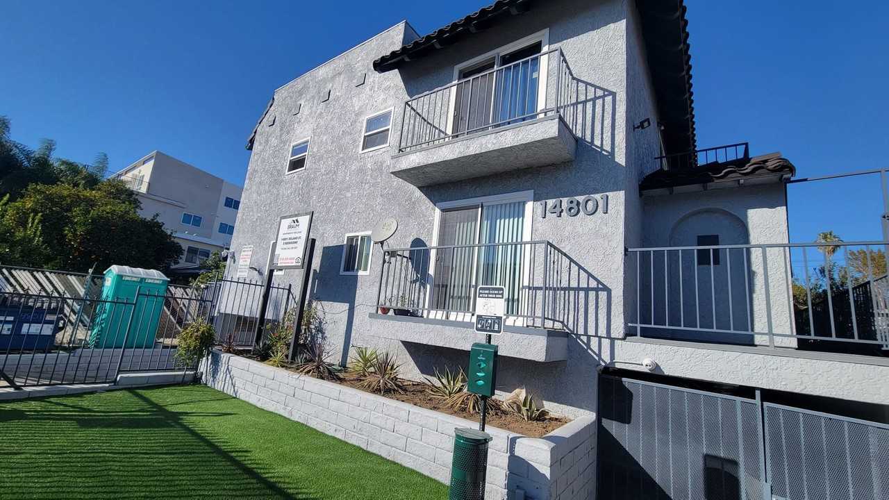 14801 DELANO ST. - Photo 2 of 4