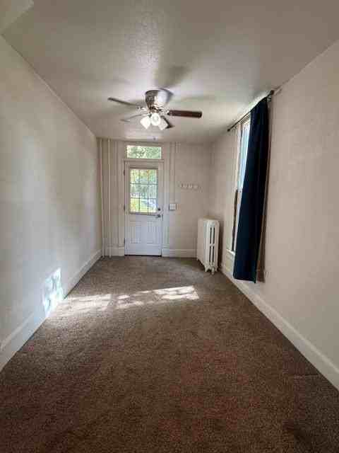 129 W 2nd St - Photo 3 of 8