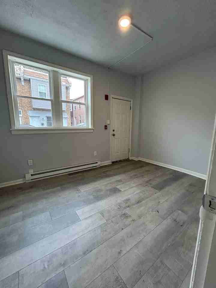 1671 Orthodox St #1F - Photo 3 of 11