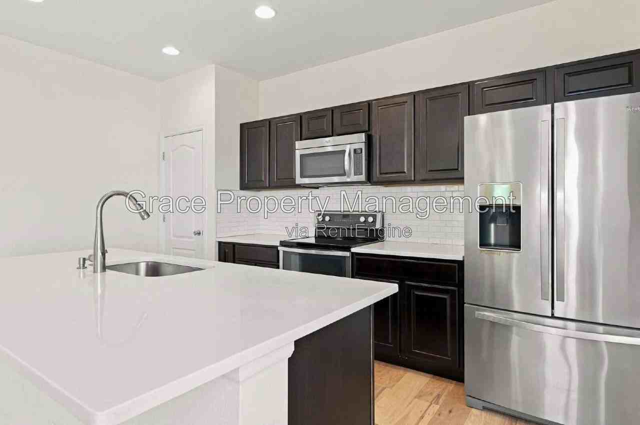 8562 E 49th Pl - Photo 6 of 26