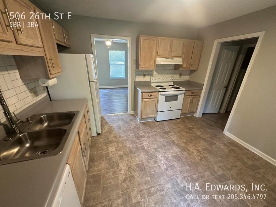 506 26th St E - Photo 7 of 14