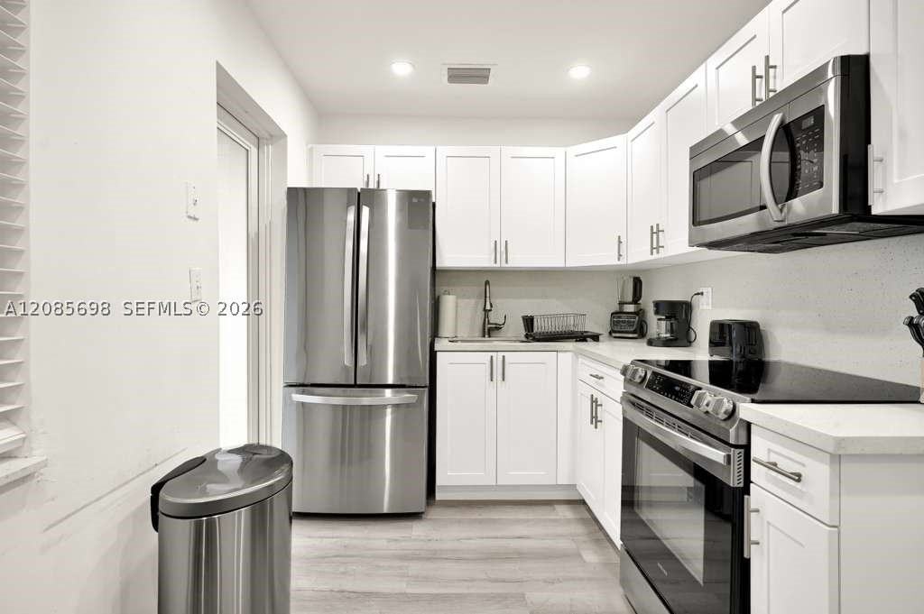300 Nw 82nd Ter #1 - Photo 7 of 12