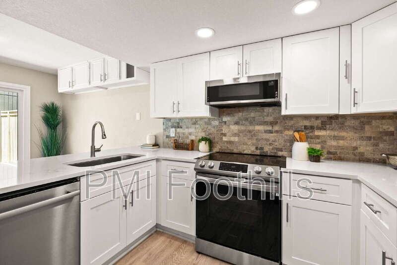 206 S Holman Way - Photo 3 of 46