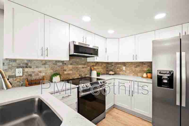 206 S Holman Way - Photo 4 of 46