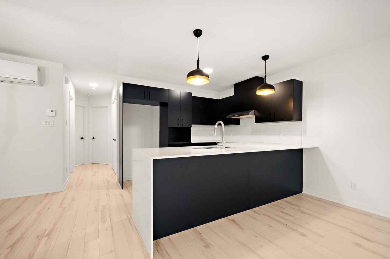 7000 Rue de Champagnier #3 - Photo 6 of 11