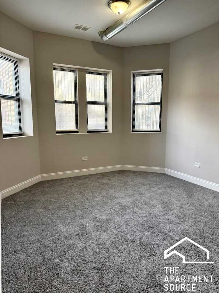 2211 E 69th St #G - Photo 2 of 8