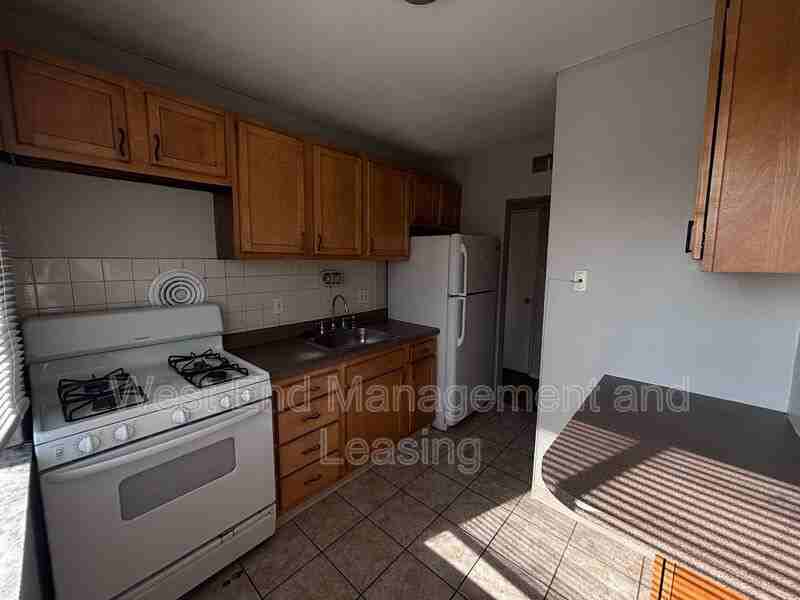 9011 Olive Blvd #2D - Photo 3 of 7