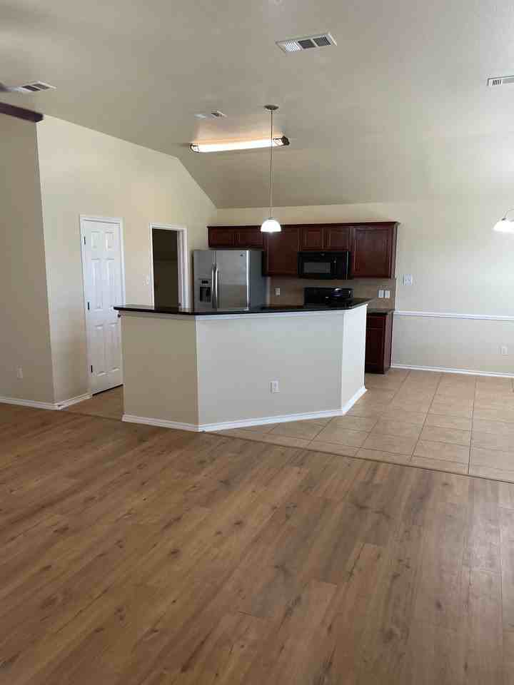 7720 Woodbury Dr - Photo 6 of 17