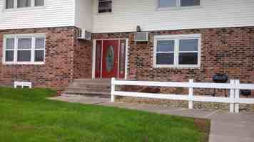 featured image of 209 E 11th St