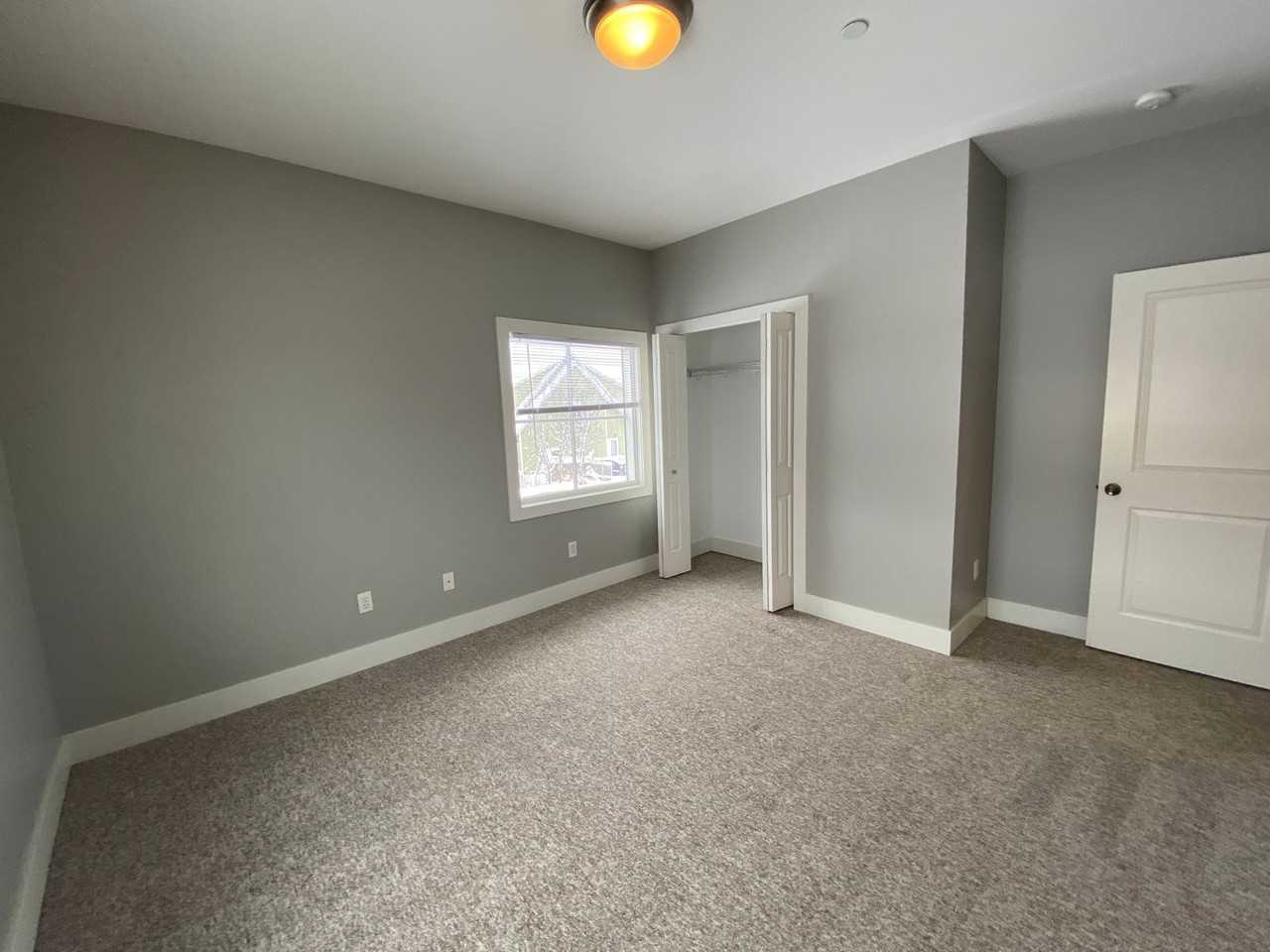 2869 Knapp St Ne - Photo 5 of 15