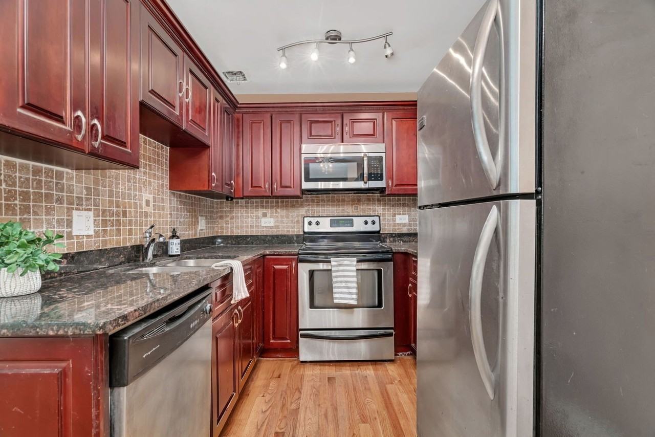 10214 S 84th Ter #312 - Photo 6 of 7