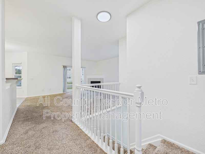 11624 W 62nd Pl #102 - Photo 2 of 25