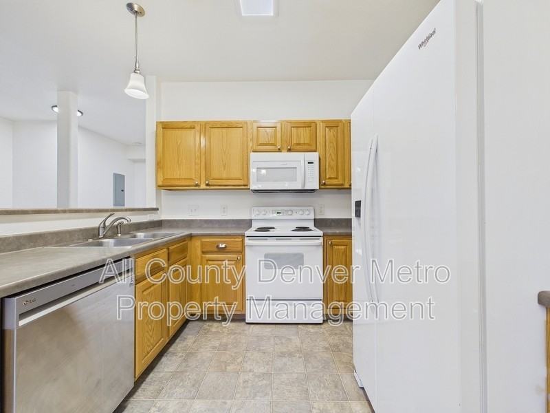 11624 W 62nd Pl #102 - Photo 7 of 25