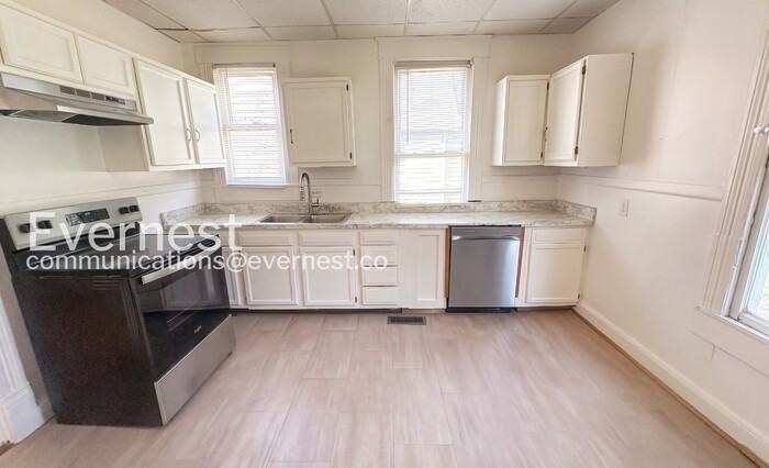 233 52nd St N - Photo 4 of 24