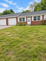 Spacious 2BR Apartments in Epsom | Garage, Basement & Large Yard - Photo 1 of 1