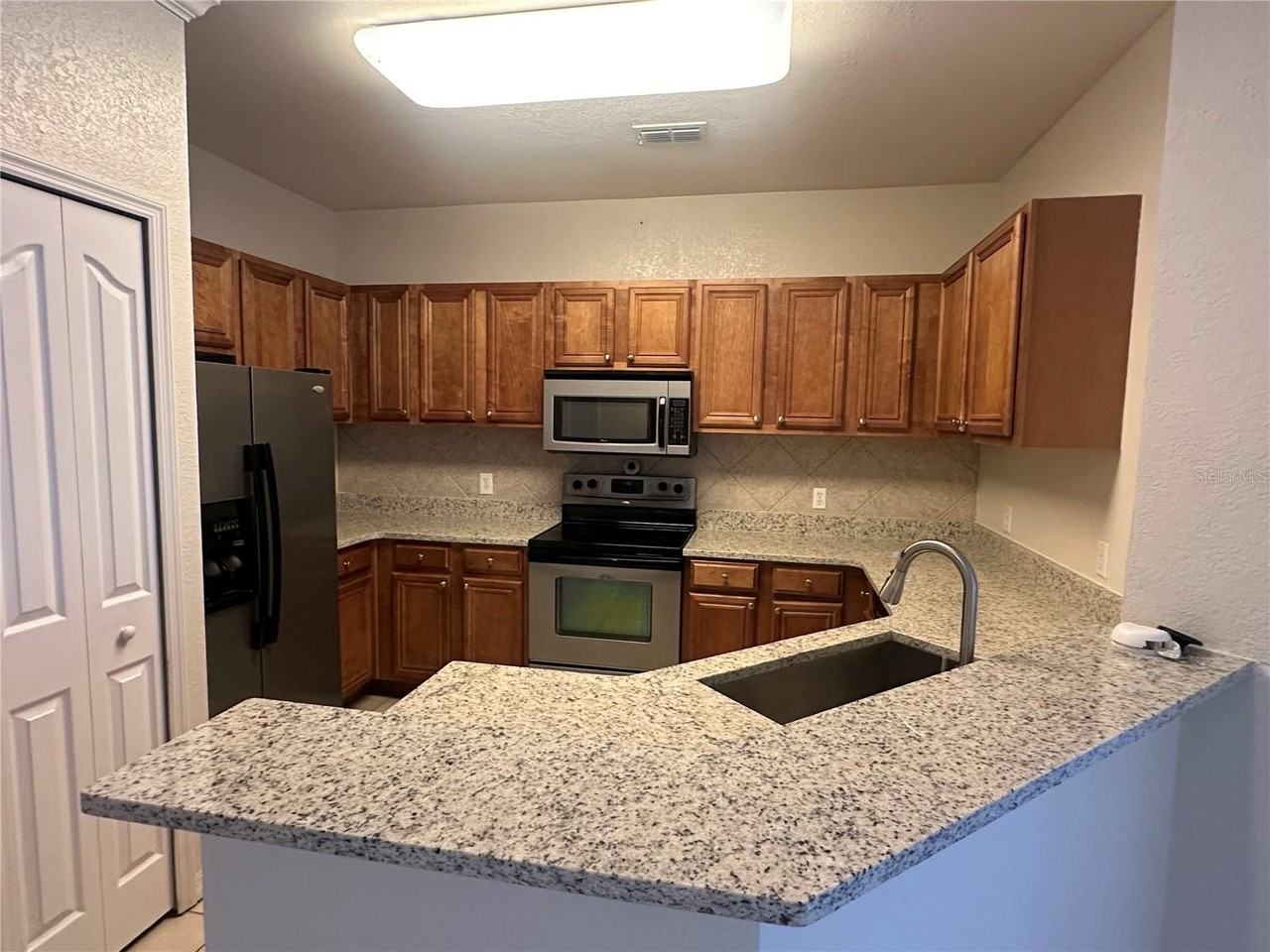 Metrowest Blvd & Metro Park Cir #103 - Photo 5 of 14