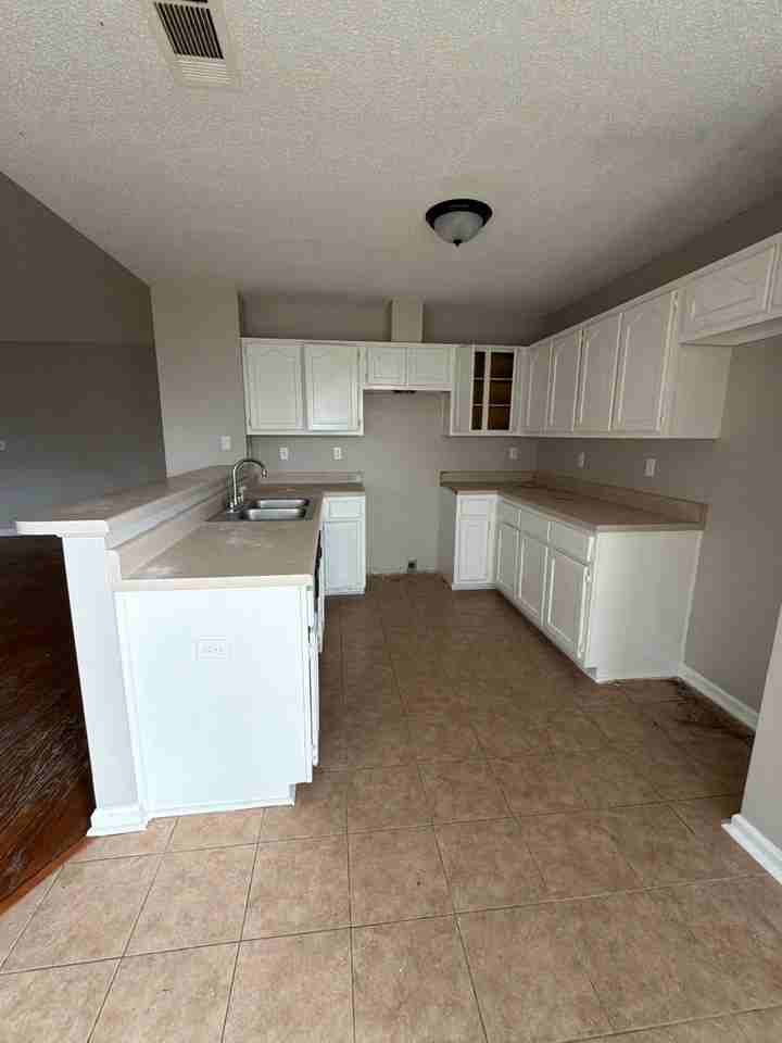 6851 Stevenwoods Ave #1 - Photo 3 of 6