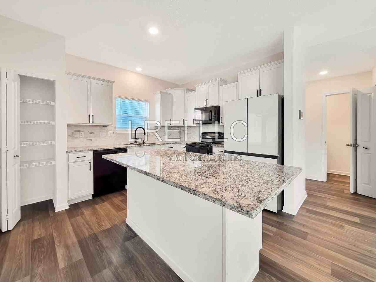 8810 Warbler Branch Way - Photo 3 of 16