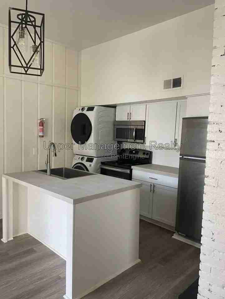 7710 Oak St - Photo 2 of 9