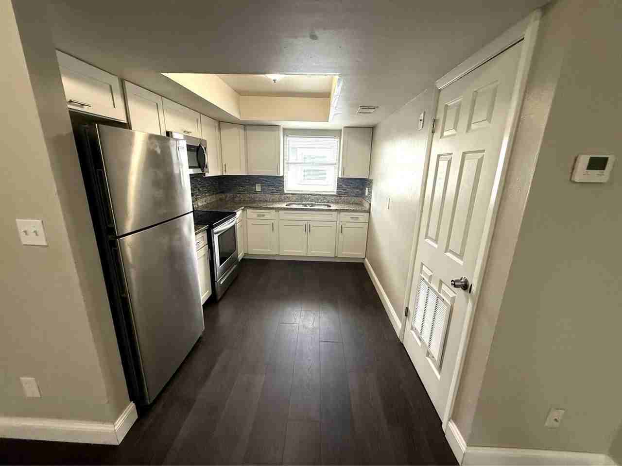 7004 S Kissimmee St - Photo 5 of 9