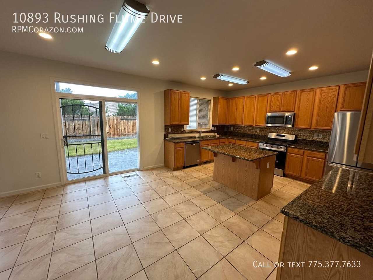 10893 Rushing Flume Dr - Photo 5 of 27