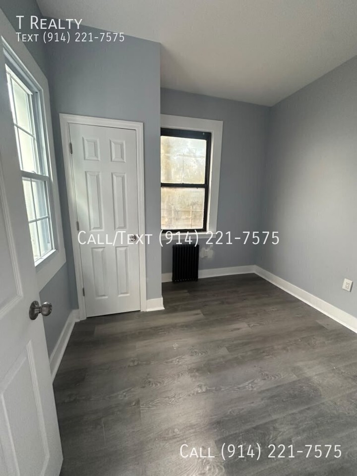 128 W 3rd St - Photo 2 of 4