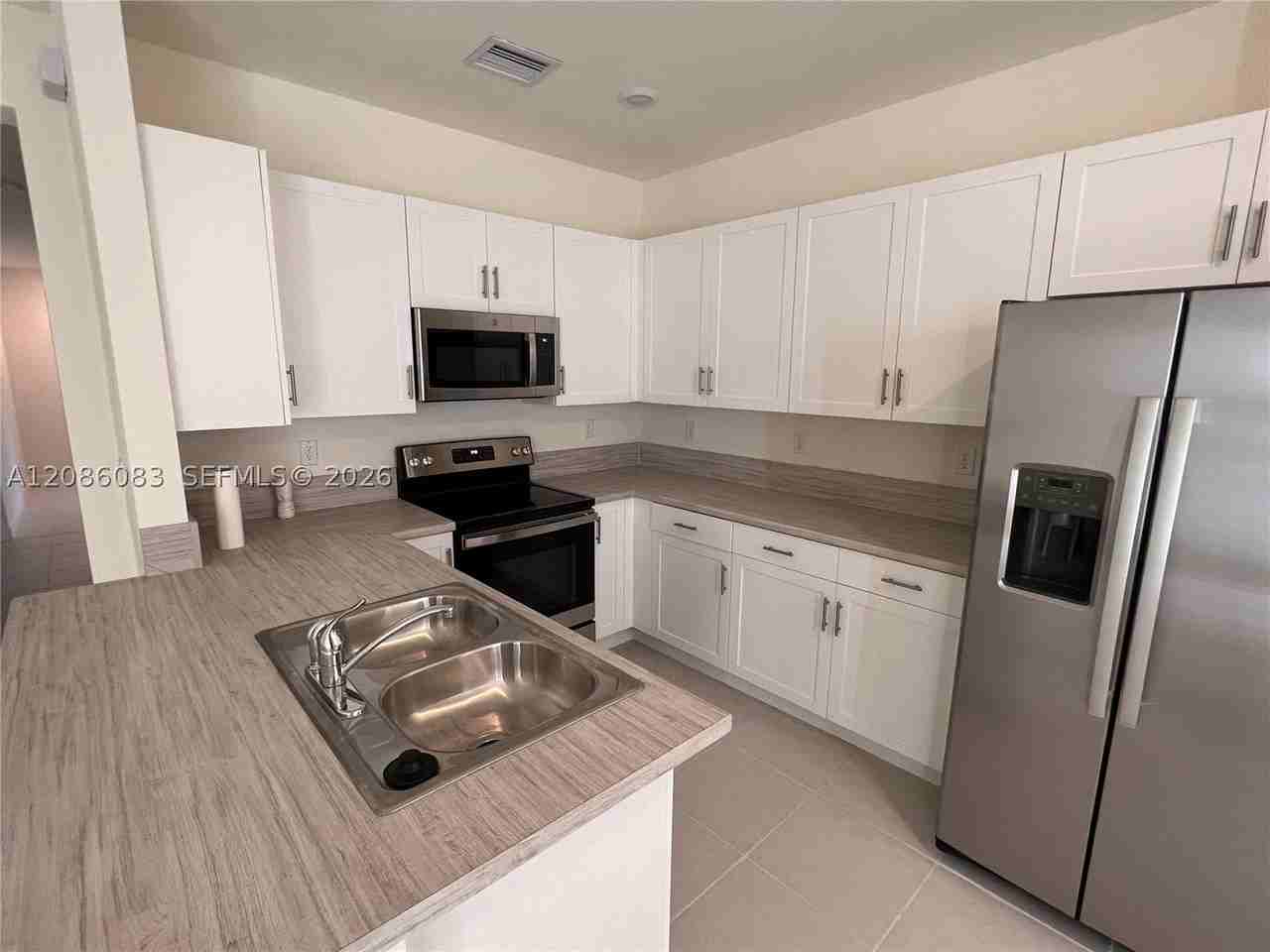 3342 W 112th St - Photo 6 of 24
