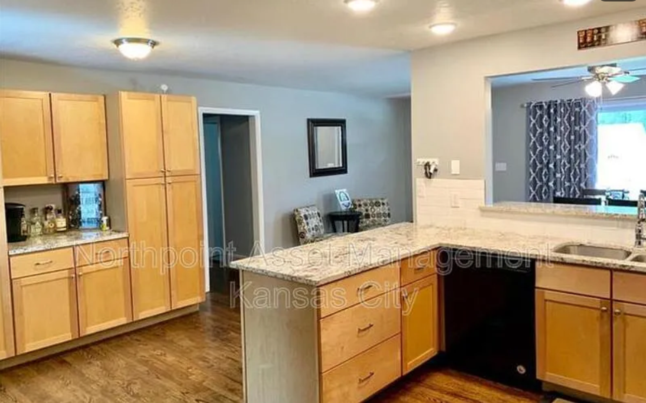 6828 W 76th Ter - Photo 2 of 2