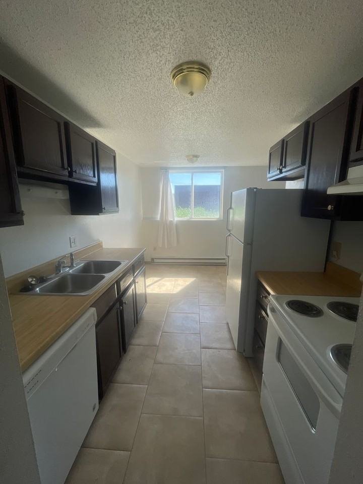 NP Apartments - Photo 5 of 13