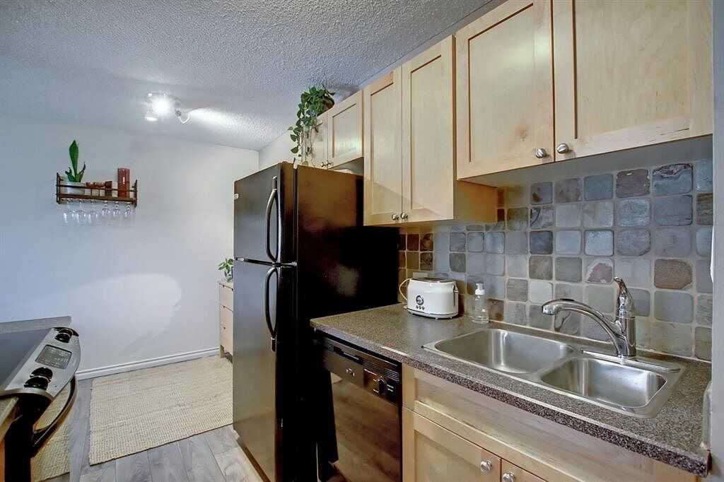 1312 - 1312 13 Ave Sw - Photo 4 of 39