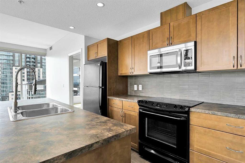 211 13 Ave Se - Photo 4 of 31