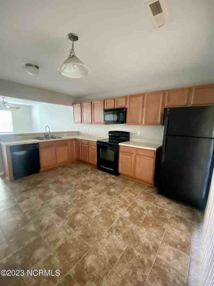 6009 Grandeur Ave - Photo 6 of 13