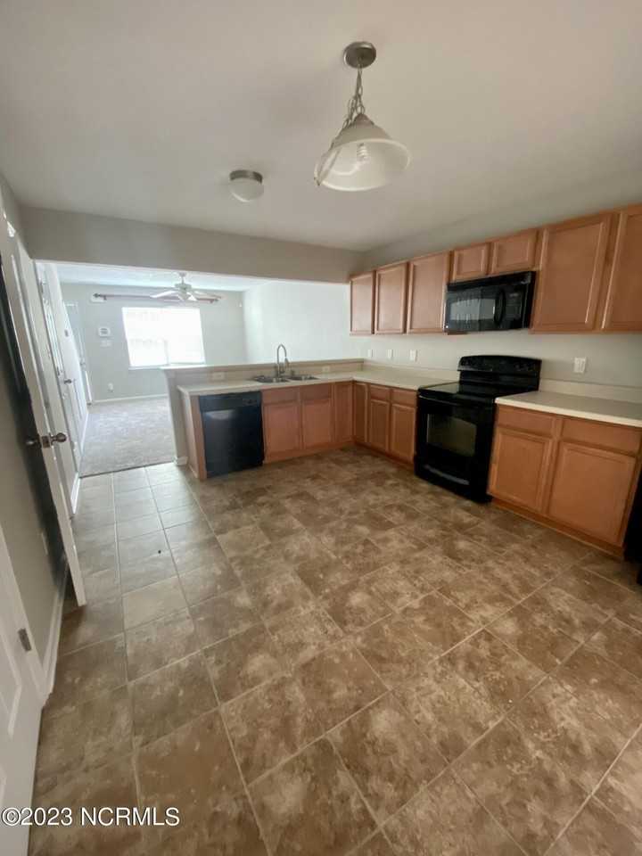 6009 Grandeur Ave - Photo 7 of 13
