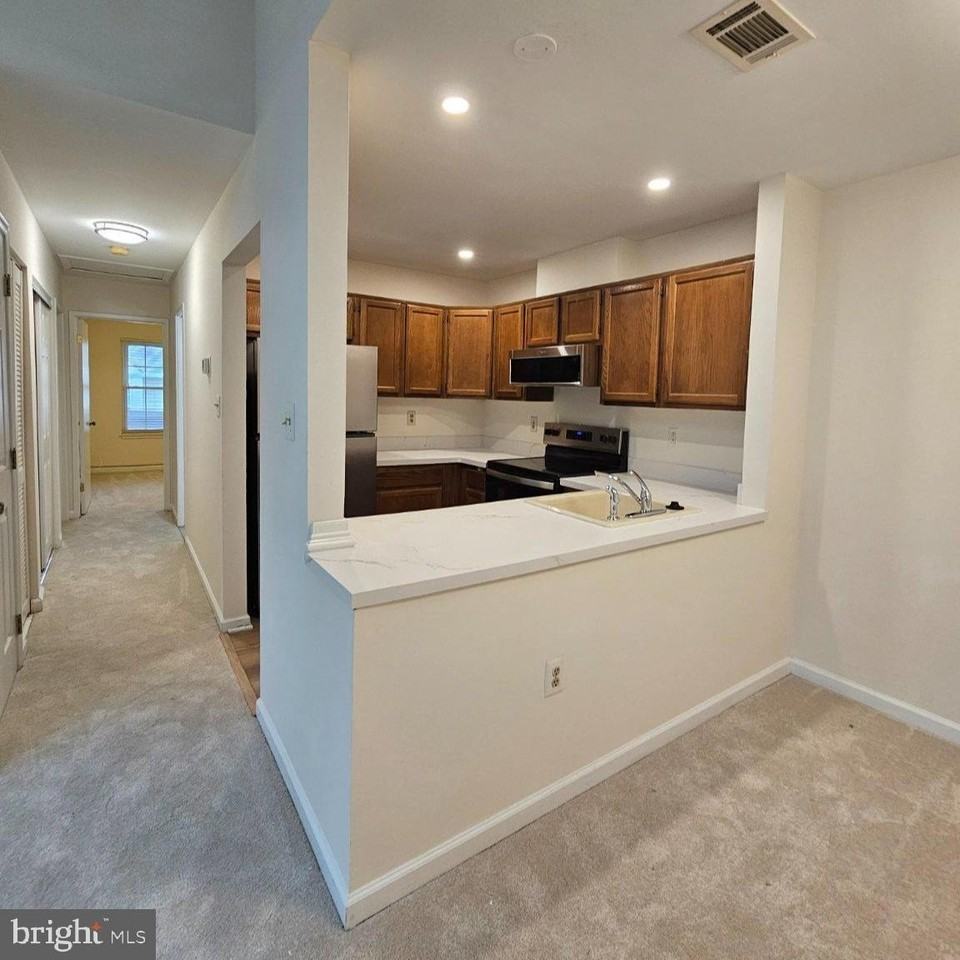 7705 Lexton Pl #E - Photo 6 of 32