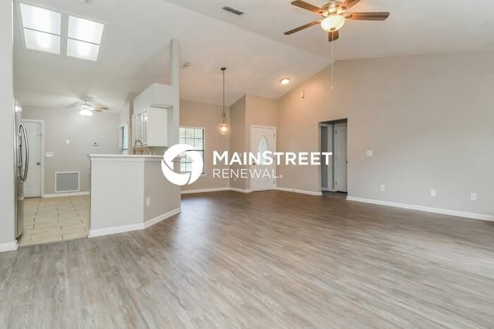 7826 Invermere Blvd N - Photo 4 of 16