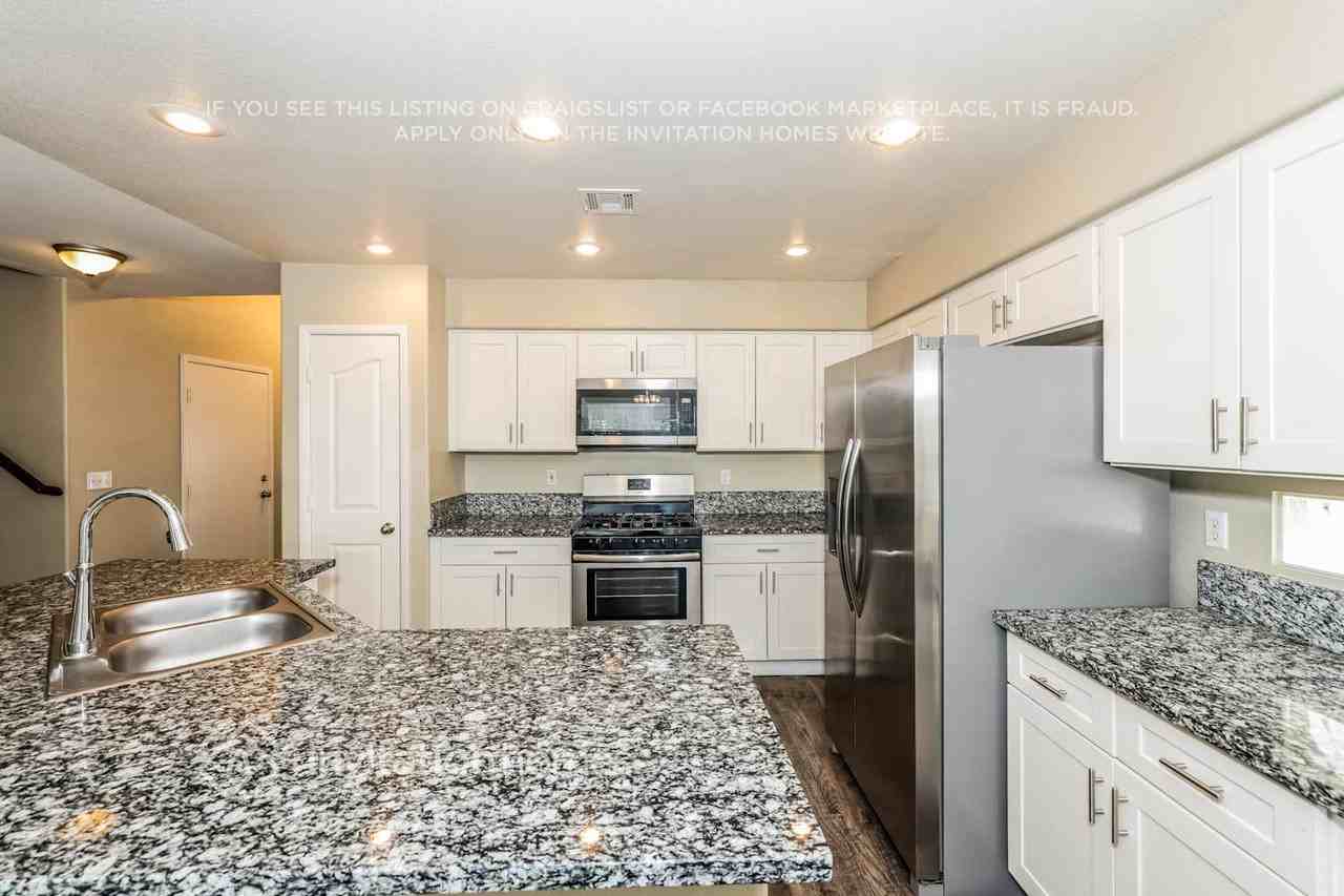 7839 Meandering Path Ave - Photo 7 of 18