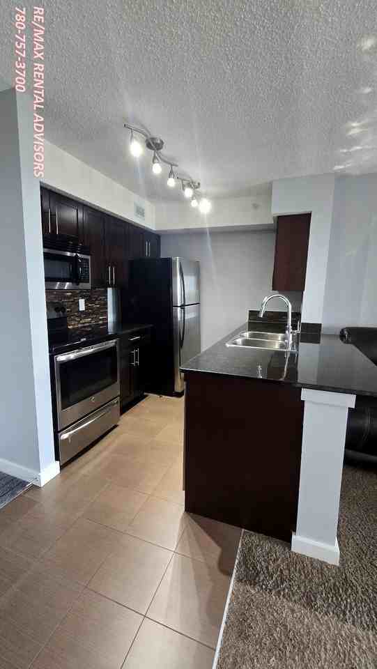 1060 Mcconachie Blvd Nw - Photo 4 of 17