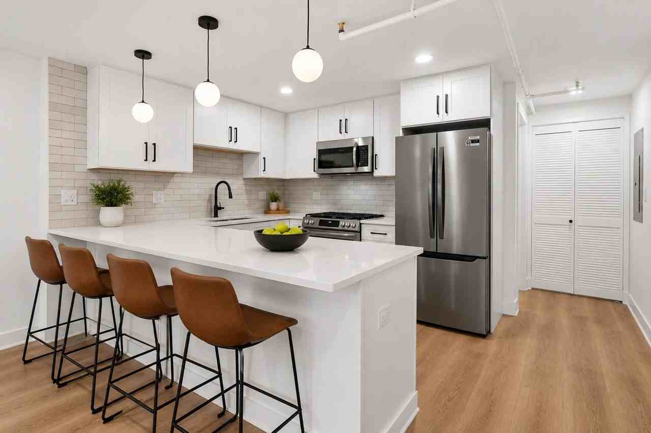 Bright Logan Square 2BR/2BA | Chef's Kitchen, In - Photo 2 of 12