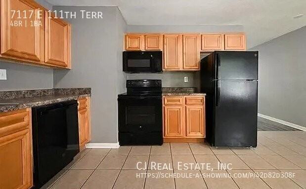 7117 E 111th Ter - Photo 5 of 11